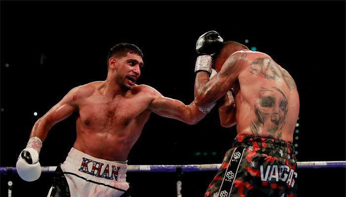 Amir Khan de Gran Bretanya en acció contra Samuel Vargas de Colòmbia a Arena Birmingham, Gran Bretanya, 8 de setembre de 2018. Imatges d